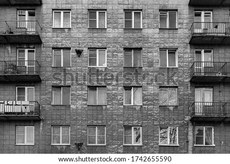 Windows of old buildings in Saint Petersburg, background-symmetry in buildings. Russia.