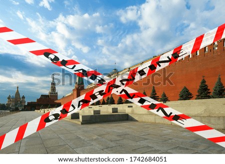 Coronavirus in Moscow, Russia. View of Kremlin (day). Quarantine sign. Concept of COVID pandemic and travel.