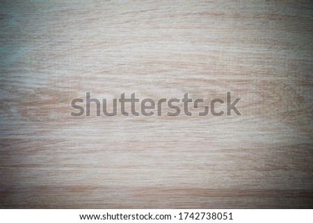 The texture of natural wood. Painted board. Background with vignetting effect