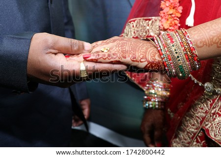 Ring Ceremony - A Hindu wedding ritual wherein couples guve ring to each other. Rings are worn in the Ring finger which is said to have a direct link with heart.