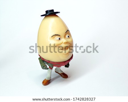 Humpty Dumpty. The cartoon character Humpty Dumpty. Humpty Dumpty figurine on a white background.