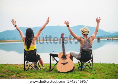 couple traveler have camping and picnic near the lake on vacation. 