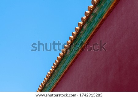 Red wall in the forbidden city. Chinese traditional symbols. Minimal background.