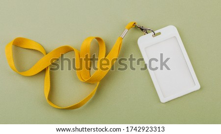 Work ID name tag. The ID of the employee. Card icons with ropes on a green background.