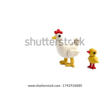 
plasticine chicken mom and chick  baby. 
farm animals on a white background