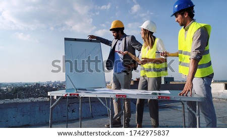 Picture of construction engineer working on building site