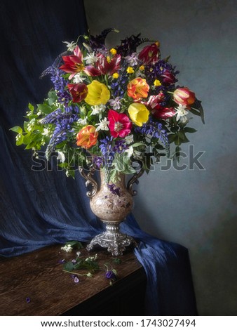 Still life with bouquet of flowers in a vase