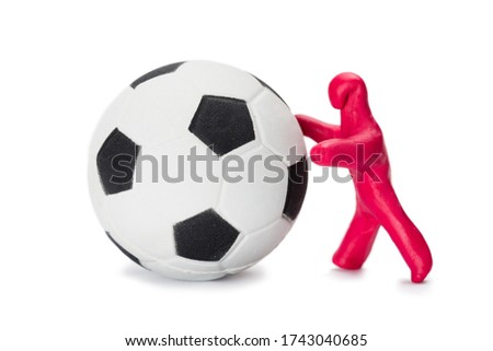 small boy soccer player with a soccer ball isolated on white