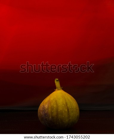light painting photography with fruits in the foreground using a phone screen flashlight