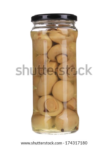 Mushrooms marinaded (champignons) in glass jar. Isolated on a white background