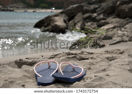 An Image from the Beach. Focus over the Slippers.
