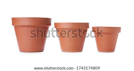 Stylish terracotta flower pots isolated on white Royalty-Free Stock Photo #1743174809