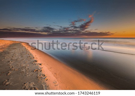Travel photography of the Baltic sea coastline.Amazing sunrise over the Sea. Jastrzebia Gora, Poland.