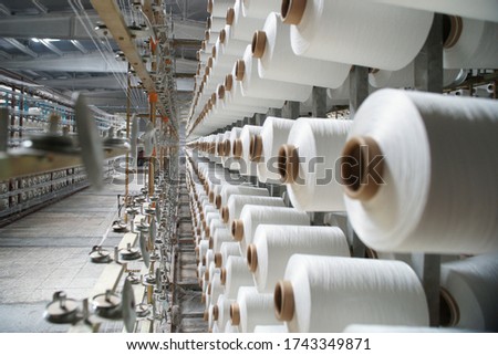 textile coils and rope, textile machine Royalty-Free Stock Photo #1743349871