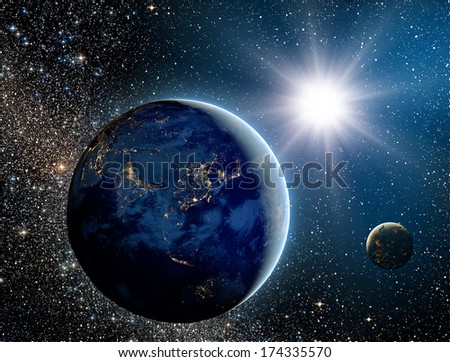 Sunrise over the planet and satellites in space."Elements of this image furnished by NASA" Royalty-Free Stock Photo #174335570