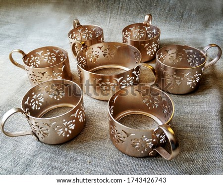 a set of six cup holders and sugar bowls - a glass holder soviet railway and traditional home cooking utensils