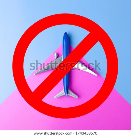 Airplane in red round ban sign, epidemic, state quarantine, stop symbol on blue pink background