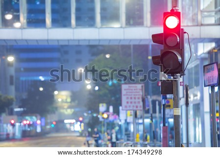 Red Traffic Light in  Hong Kong at night