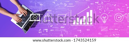 Marketing concept with woman using a laptop computer