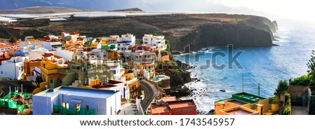Grand Canary island. traditional architecture, colorful houses, Puertito de Sardina in north,scenic coastal village. Royalty-Free Stock Photo #1743545957