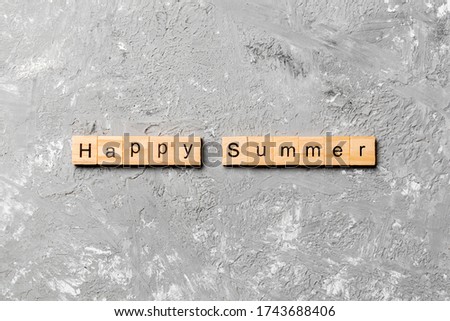 Happy Summer word written on wood block. Happy Summer text on cement table for your desing, concept.