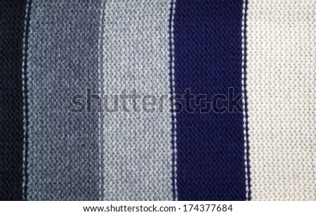 Endless white, black, blue, and gray striped fabric