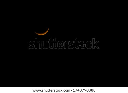 The Third or Last Quarter Moon is also called a Half Moon on golden color 2020: The half lunar glow in the night sky and evening people to see super moon on lock down. Earth half lunar moon 2020.