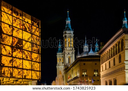 Night photo of the Basilica del Pilar in Zaragoza (Spain) town hall and museum.