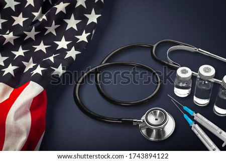 Waving american flag and medical instruments