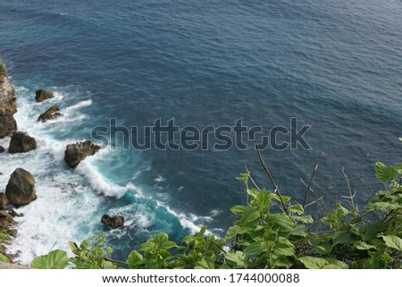 Uluwatu temple and ocean view from cliff 