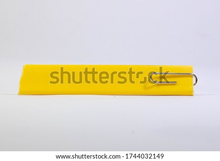 Paper clips used for easy reading and book clips for documents