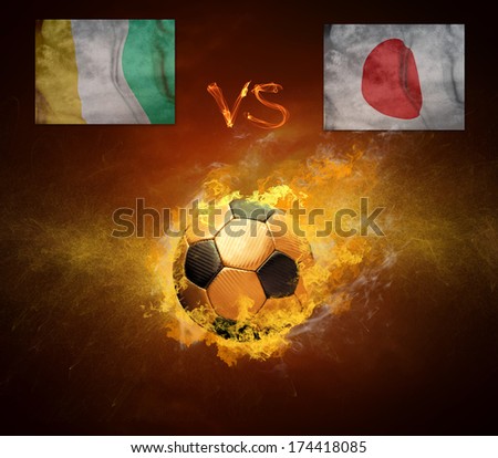 Hot soccer ball in fires flame, friendly game beetwin Cote d'Ivoire and Japan