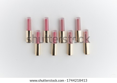 pink and purple lipstick flat-lay product photoshoot able to put your brand