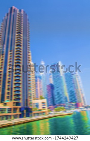 blurred buildings with blue sky