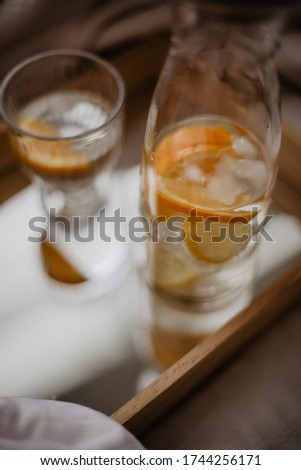ice beverage with lemons and oranges