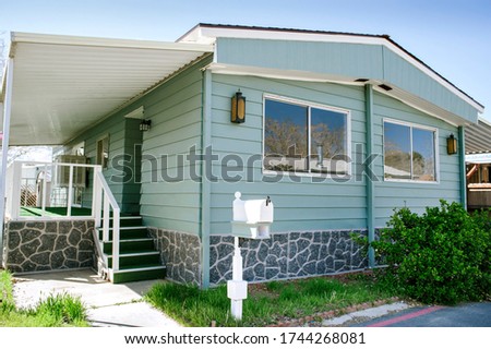 Affordable home in a mobile home park - Property Investment - Low Income - Cash flow Royalty-Free Stock Photo #1744268081