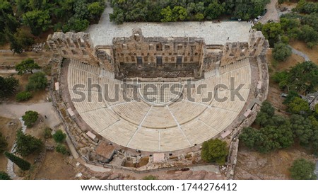 Aerial drone photo of Odeon of Herodes Atticus a stone theatre structure located on the southwest slope of the Acropolis of Athens, Attica, Greece
