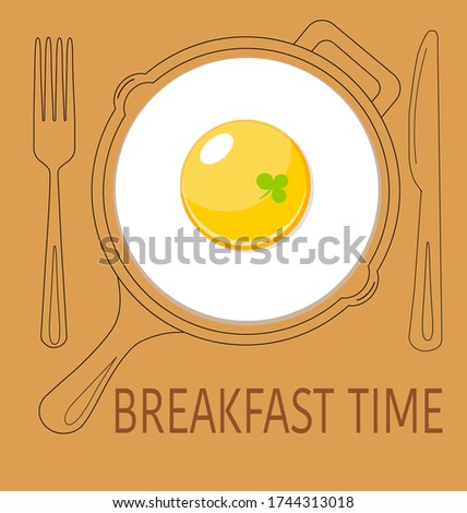 brown background with breakfast on a plate with an egg, knife and fork