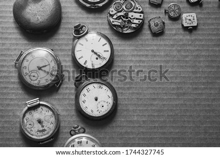 set of vintage pocket watches on the table
