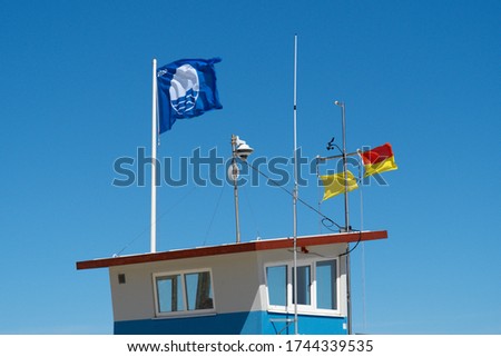 The Blue Flag is an international award for beaches and marinas. Rescue station on the beach.