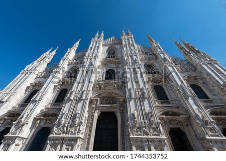 Horizontal picture of the facade of Duomo di Milano, an important catholic cathedral in Milan, Italy.