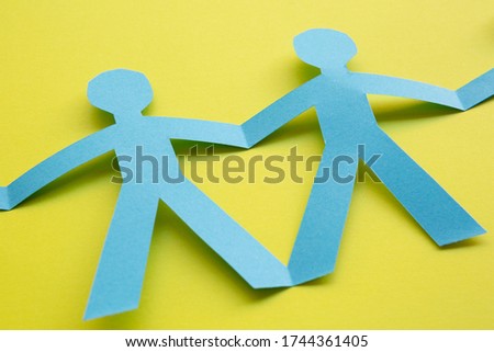 Paper silhouettes representing various ideas about unity.