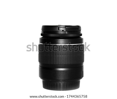 Black lens for the camera close-up on an isolated white background. Engaging in photography or videography