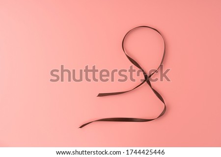 Random ribbon on a pink background