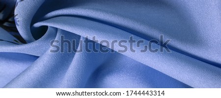 Texture, background, pattern, Crepe de Chin. pale blue, brown flowers. This is a group of silk, characterized by roughness, as well as slightly wrinkled.