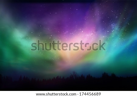 Multicolored northern lights (Aurora borealis)on Canadian forest Royalty-Free Stock Photo #174456689