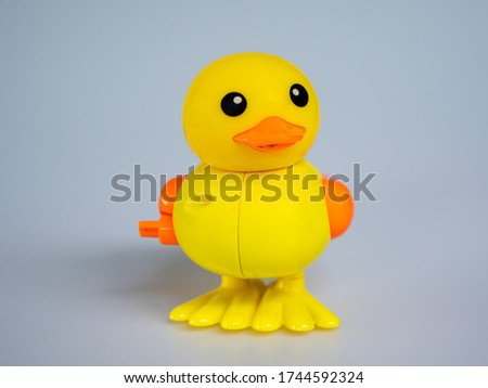 Yellow duck toy isolate white background for child playing.