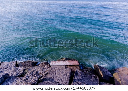 Custom wooden bench with sea view on the Caspian sea.