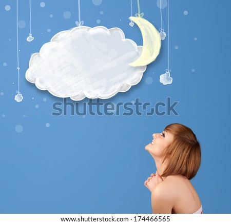 Young girl looking at cartoon night clouds with moon hanging down