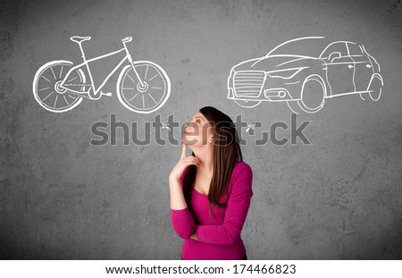 Pretty young woman taking a decision between bicycle and car